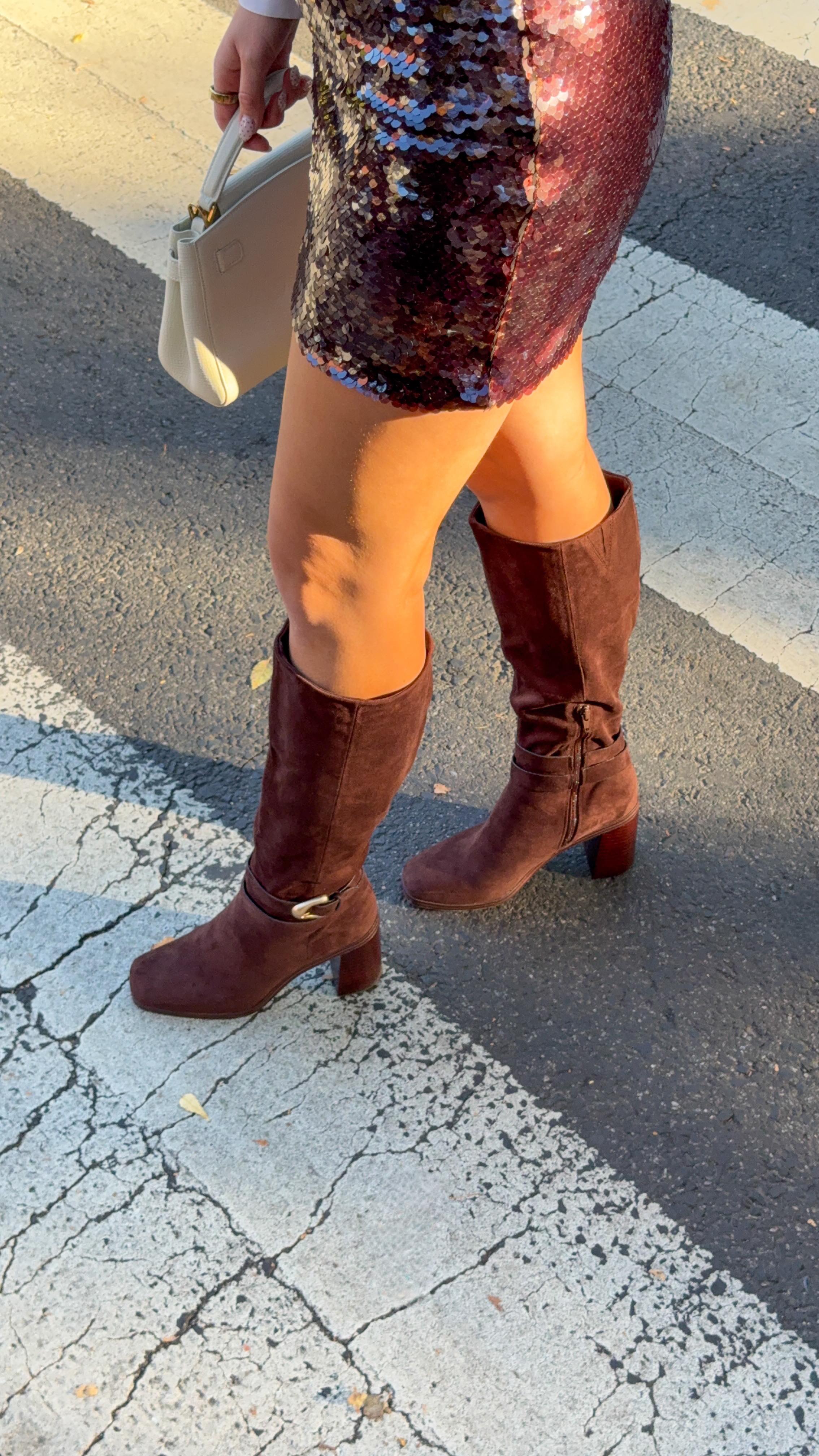 Instagram post by @peytonjohnsonnn for Famous Footwear. Caption reads: [...] in the holiday spirit with my....