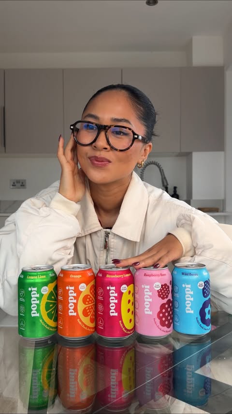 Instagram post by @wear.juti.eats for Poppi. Caption reads: tasting and ranking all 5 @drinkpoppi flavours now....