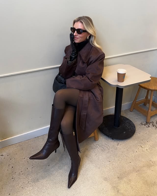 Instagram post by @nataliemariejust for JustFab. Caption reads: [...] my hot chocolate ☕️ The best boots always....