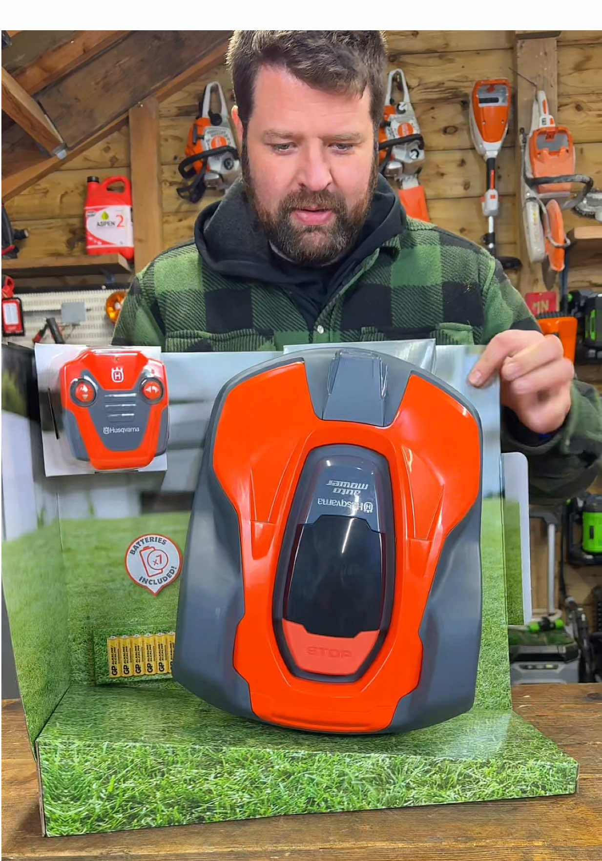 TikTok post by @machinerynation for Husqvarna. Caption reads: Christmas gift ideas unboxing Husqvarna toy....