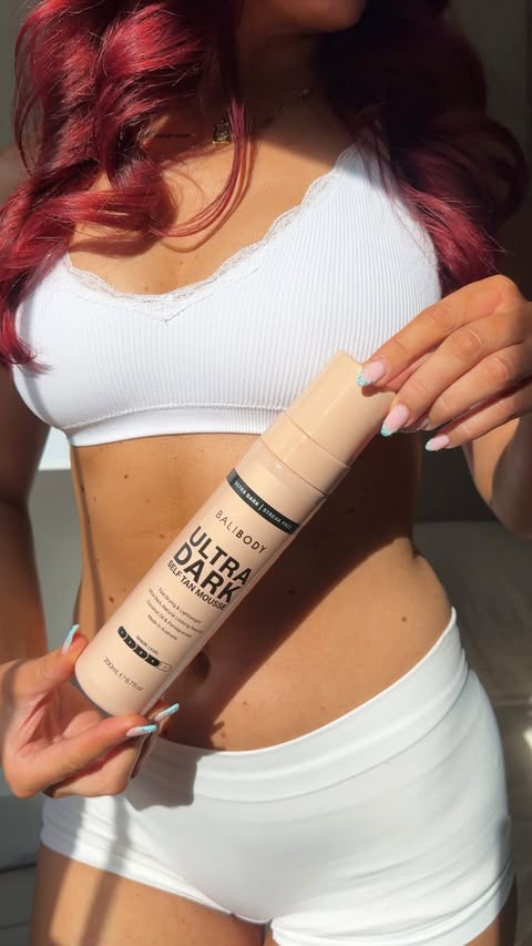 Instagram post by @socialswithclaudia for BALI BODY. Caption reads: Ultra Dark Mousse just hits different @balibody 🤎....