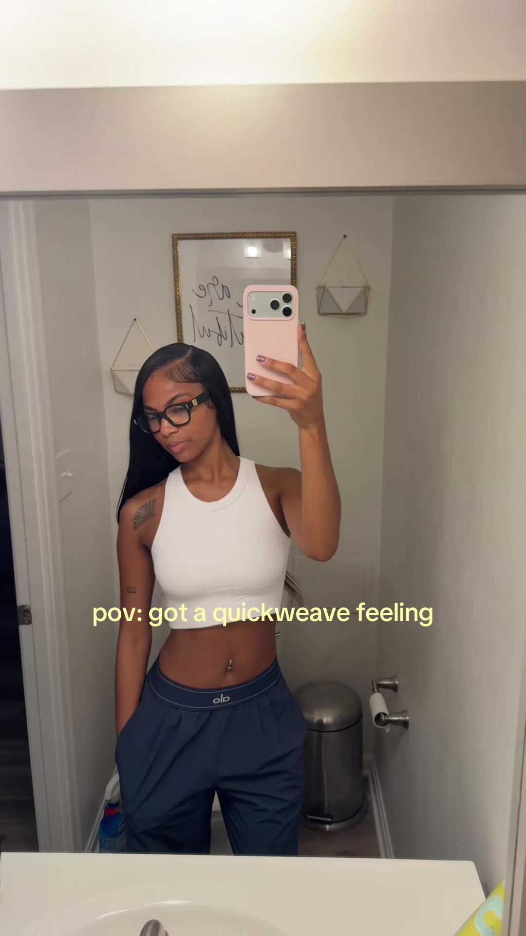 TikTok post by @thelaurynjada for AshineHair. Caption reads: These bundles straightened so good😍 @AshineHair....