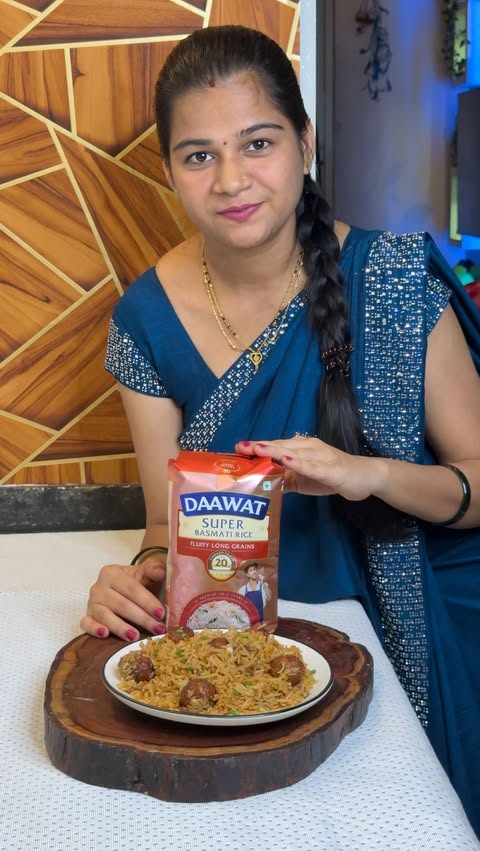Instagram post by @cooking_with_anita_2021 for Daawat. Caption reads: [...] Fried Rice banaya using my favourite Daawat....