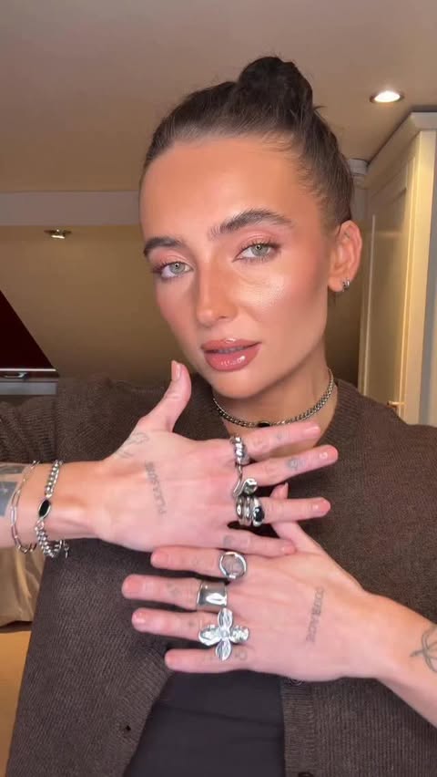 Instagram post by @angieholdenn for BOHOMOON. Caption reads: [...] ring stack and some huggie earrings!....