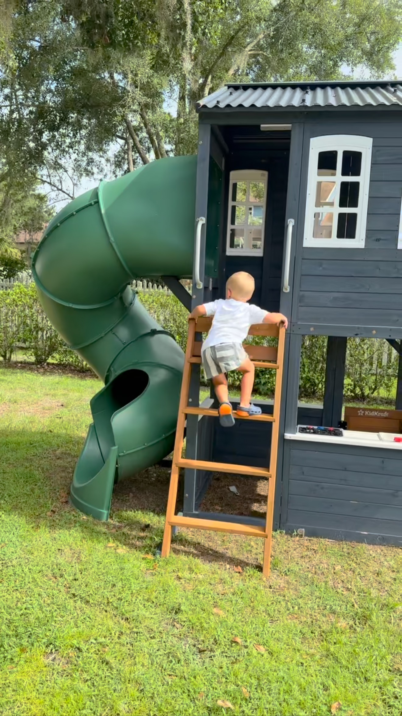 Instagram post by @daylehoffmankerns for KidKraft. Caption reads: [...] backyard for the kids thanks to....