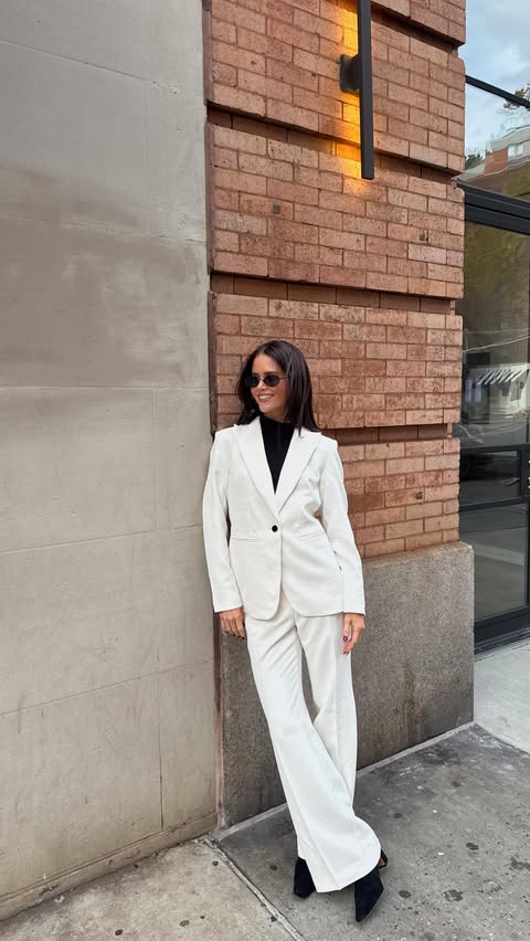 Instagram post by @julietmackayy for Ann Taylor. Caption reads: It’s officially suit season! Help me pick a suit....