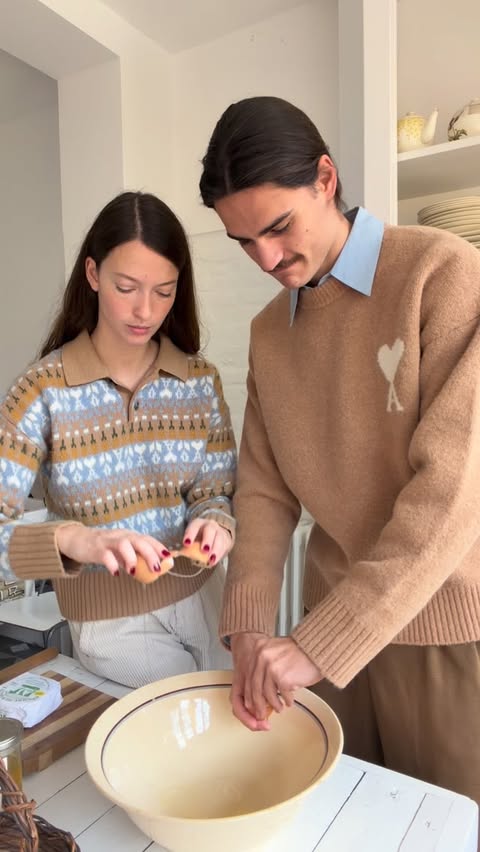 Instagram post by @alicemoireau for AMI Paris. Caption reads: A cosy Holiday season recipe for @amiparis....