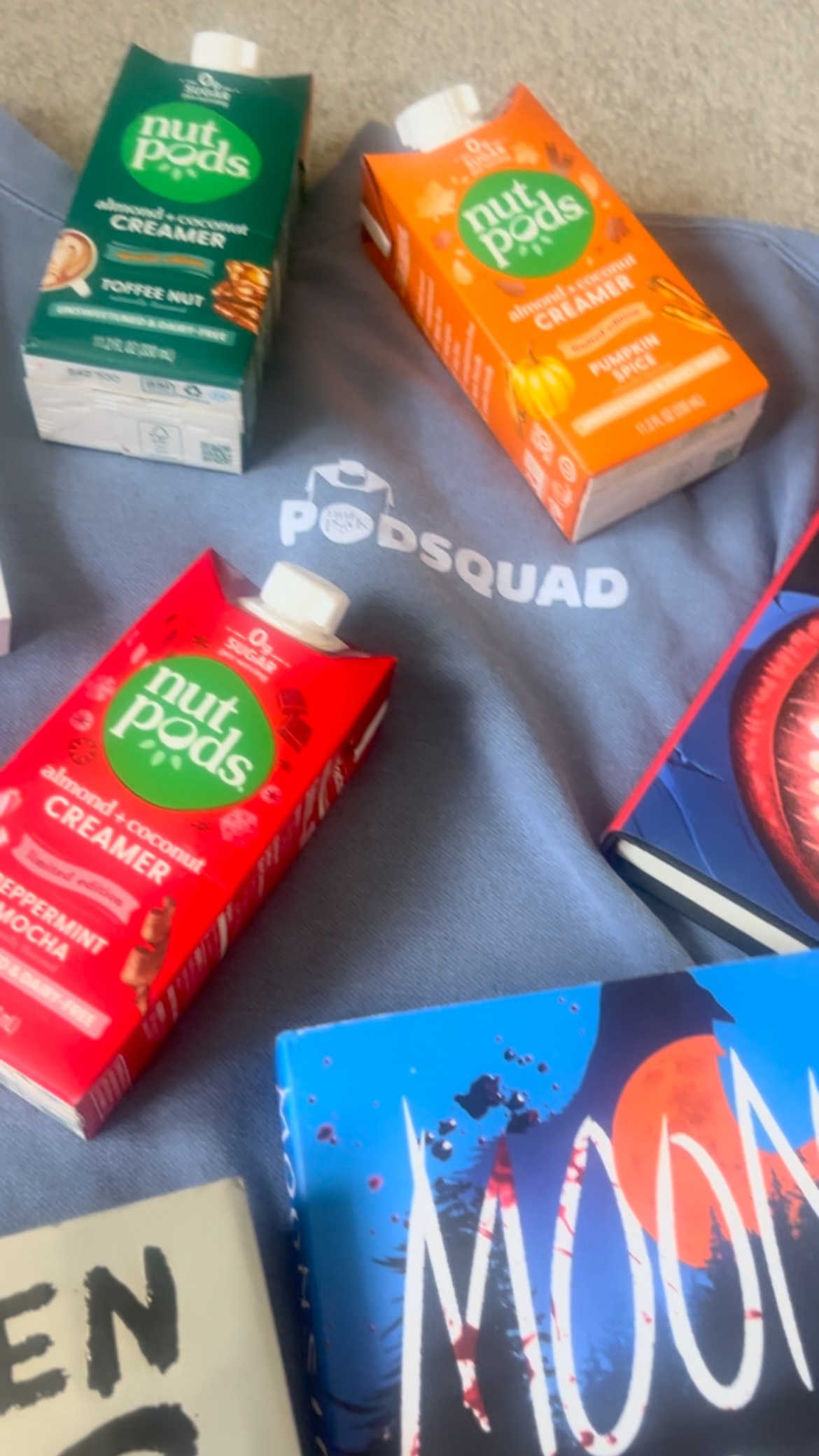 Instagram post by @blondie_book_babe for nutpods. Caption reads: [...] with a cup of coffee and a splash of....