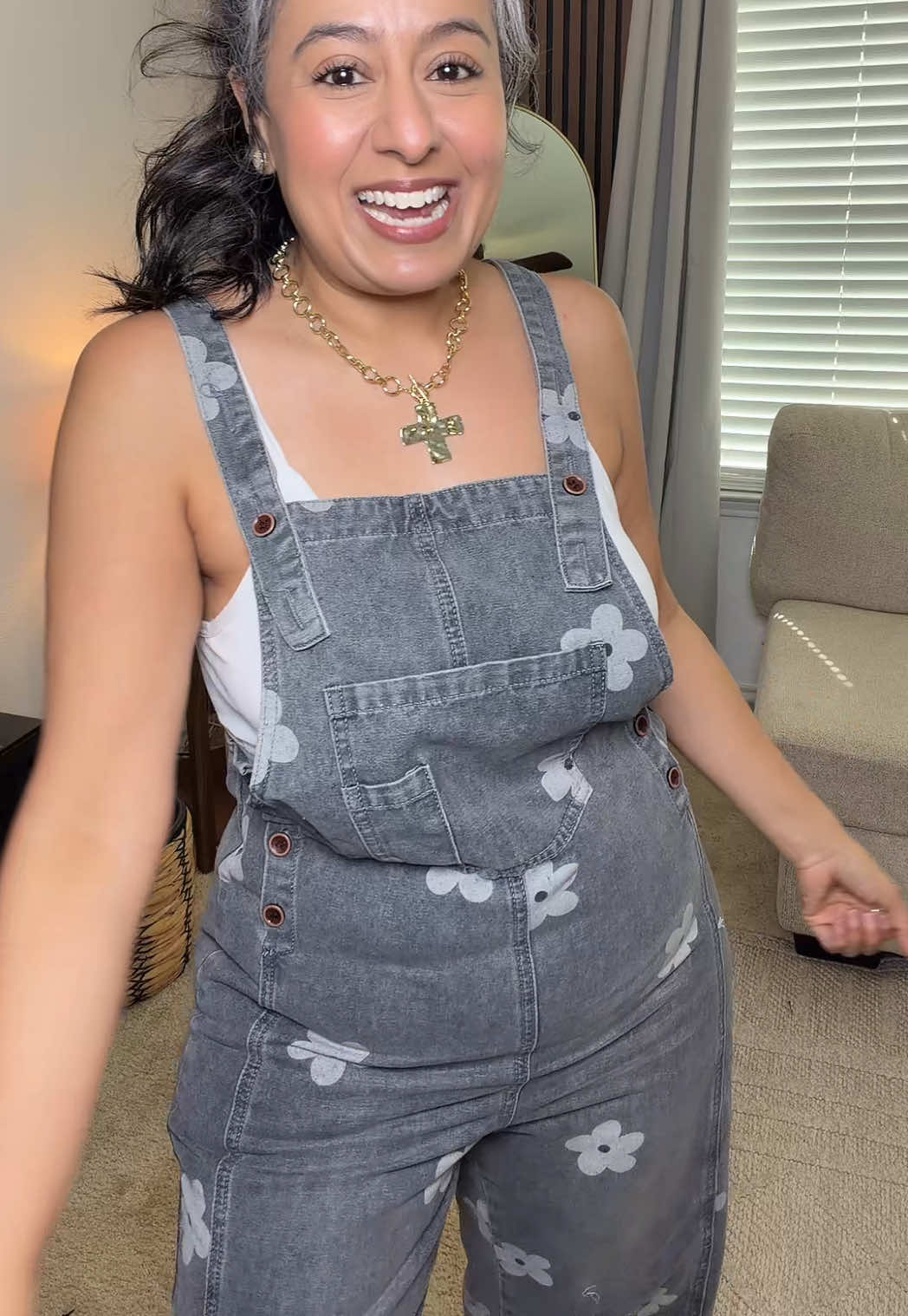 TikTok post by an influencer for UTCOCO. Caption reads: [...] cutest floral #overalls from @UTCOCO....