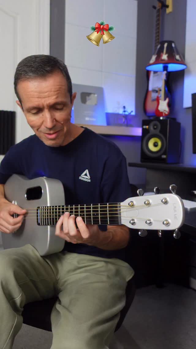 Instagram post by @walterfingerstyle for LAVA MUSIC. Caption reads: A little Christmas fingerstyle on the LAVA ME Air....