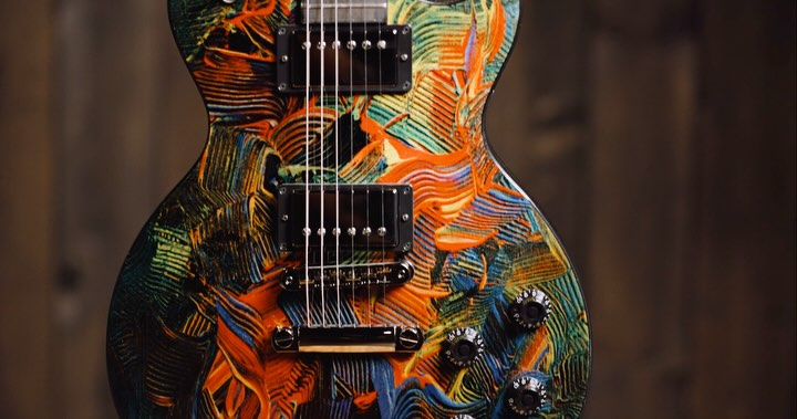 Instagram post by @serjtankian for Gibson. Caption reads: [...] concerts playing my custom “Foundations”....