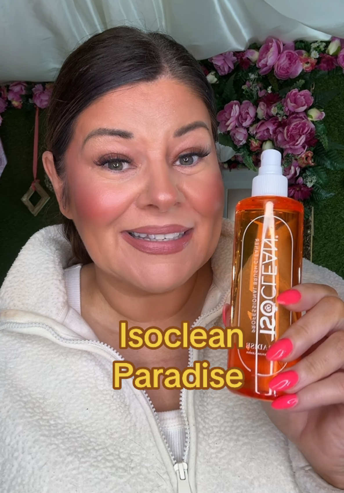 TikTok post by @leannewarrenhestermua for ISOCLEAN. Caption reads: My makeup studio smells amazing now! @ISOCLEAN....