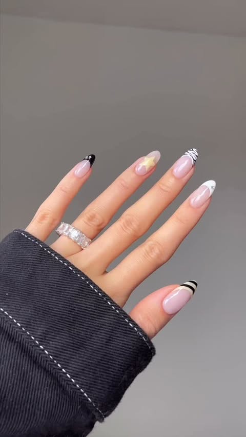 Instagram post by @nailsbyalsn for essie. Caption reads: a fun mix of prints with @essie 🦓⛓️💛 using....