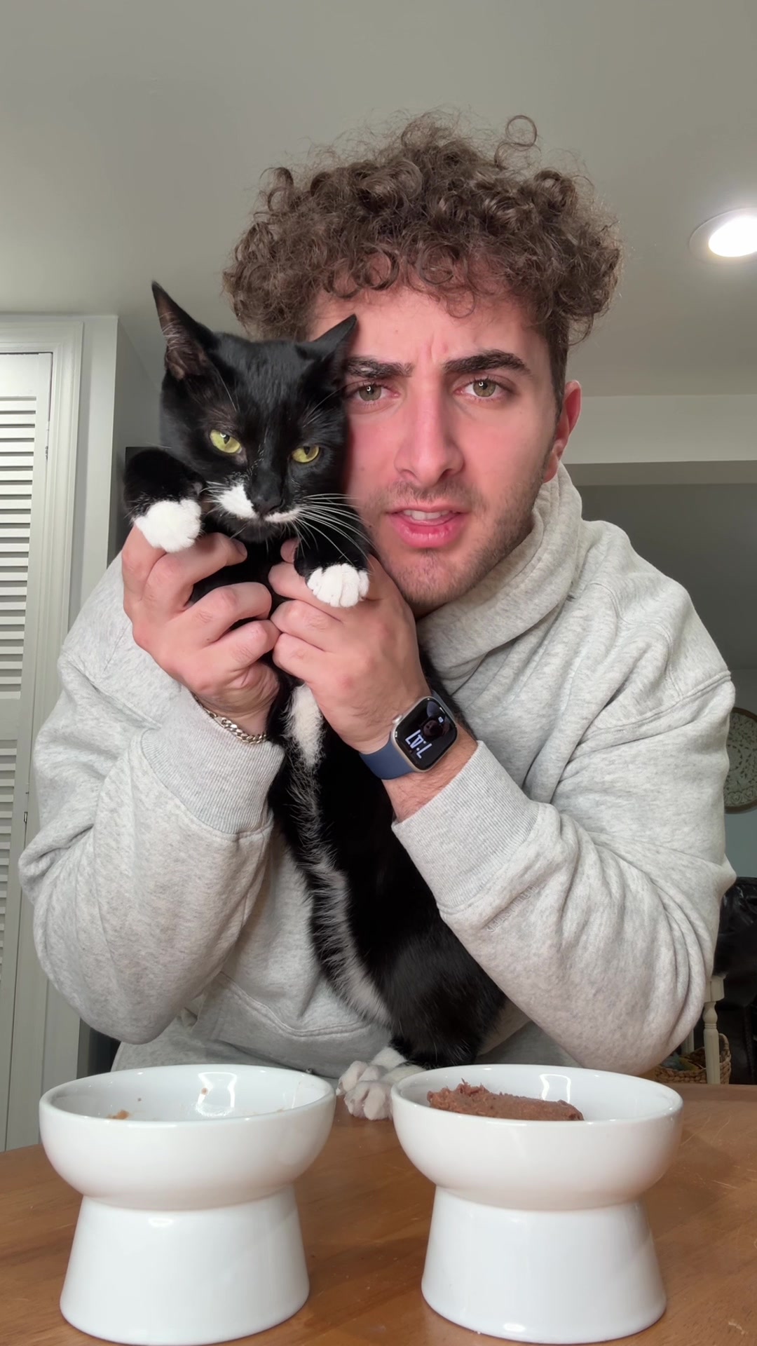 TikTok post by @prettyboychristiann for Wellness Pet Food. Caption reads: [...] her Wellness Appetizing Entrées by @Wellness....