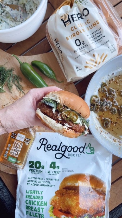 Instagram post by @ketomealrecipe for Hero Bread. Caption reads: ✨JALAPEÑO HOT HONEY CHICKEN SANDWICH✨details....