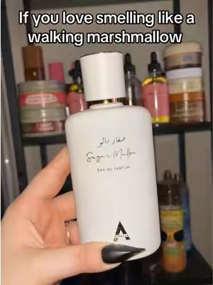 TikTok post by @ary_fragrance for Atralia Perfumes. Caption reads: [...] a sugared marshmallow cloud ☁️🍬 @ATRALIA....