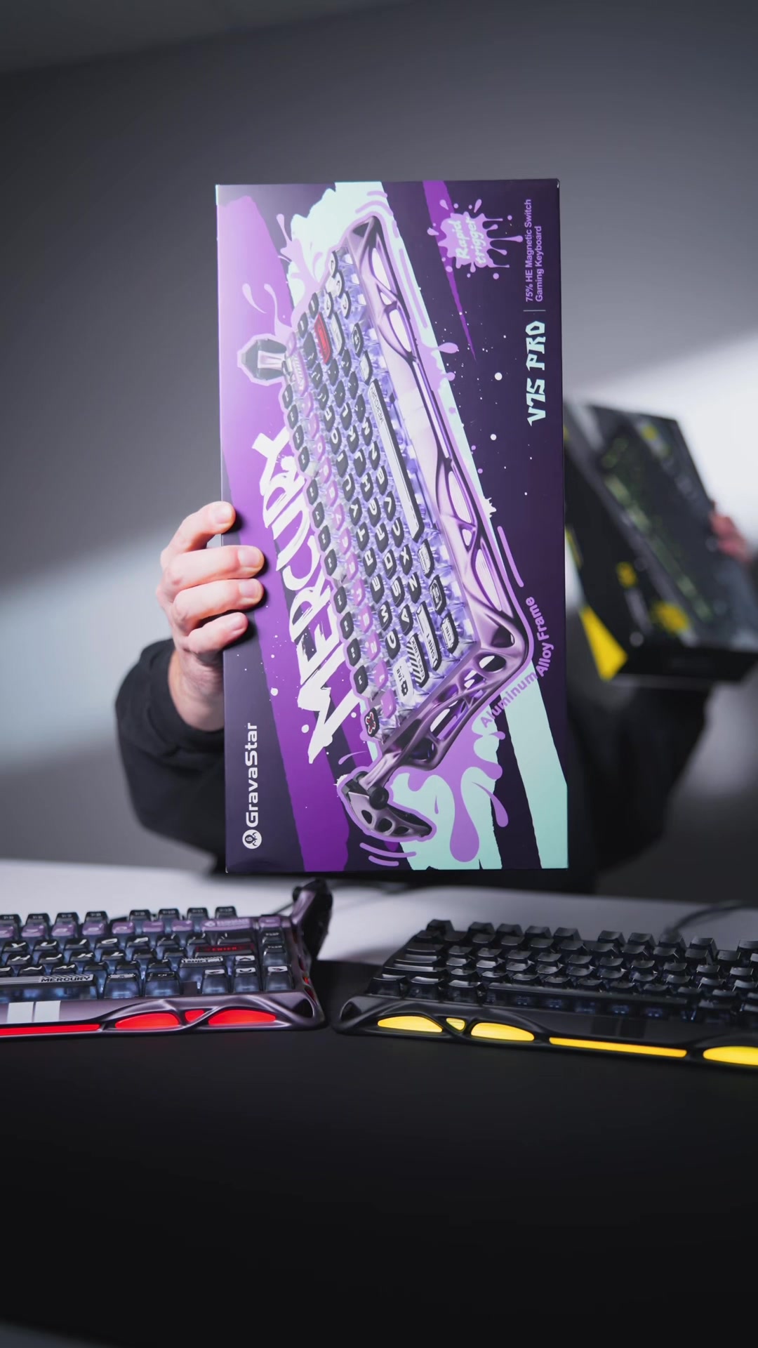 TikTok post by @ogrobbytv for GravaStar. Caption reads: [...] black & V75 Pro Iron Purple keyboard....