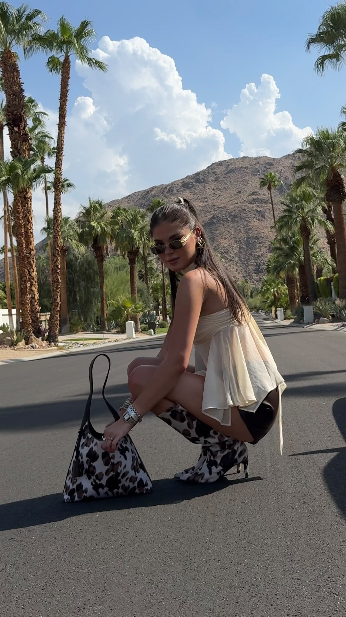 Instagram post by @yuliyacalister for callitspring. Caption reads: [GIVEAWAY] Who says boots are just for sweater....