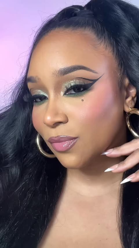 Instagram post by @lyric_sherade for Black Radiance Beauty. Caption reads: Serving sleek drama with @blackradiancebeauty....