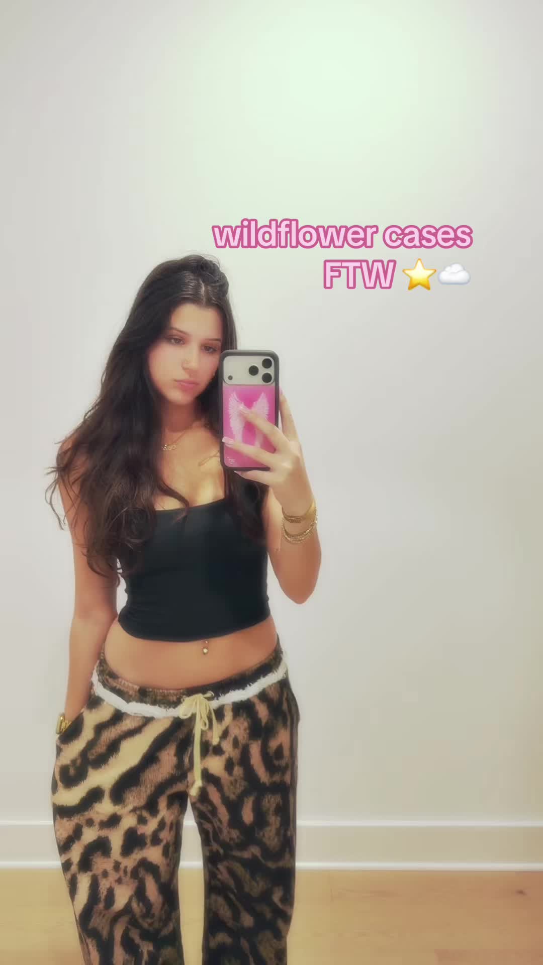 TikTok post by @mackenzycooley for Wildflower Cases. Caption reads: @Wildflower Cases.