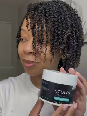 TikTok post by @glam.tam for MICHE Beauty. Caption reads: Wow @MICHE Beauty This Scuplt Curl Defining Gel is....