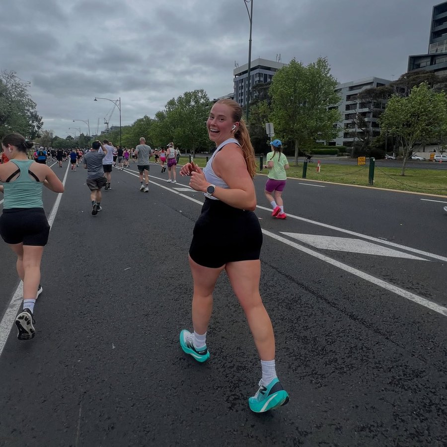 Instagram post by @madelinedaffara for Nimble Activewear. Caption reads: Never thought I’d say I enjoyed running a half....