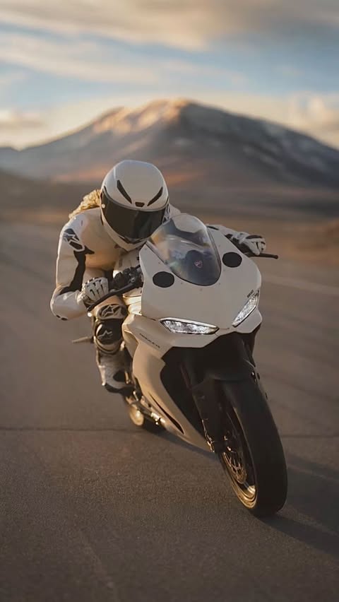 Instagram post by @jordan_rand for Ducati. Caption reads: I’ll take my chances 💜🏍️ @welovecoco @ducatiusa....