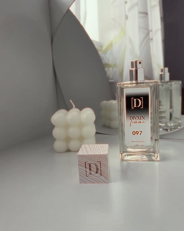 Instagram post by @cristina_angel89 for DIVAIN Parfums. Caption reads: [...] fragrance with Divain! I Want It!....