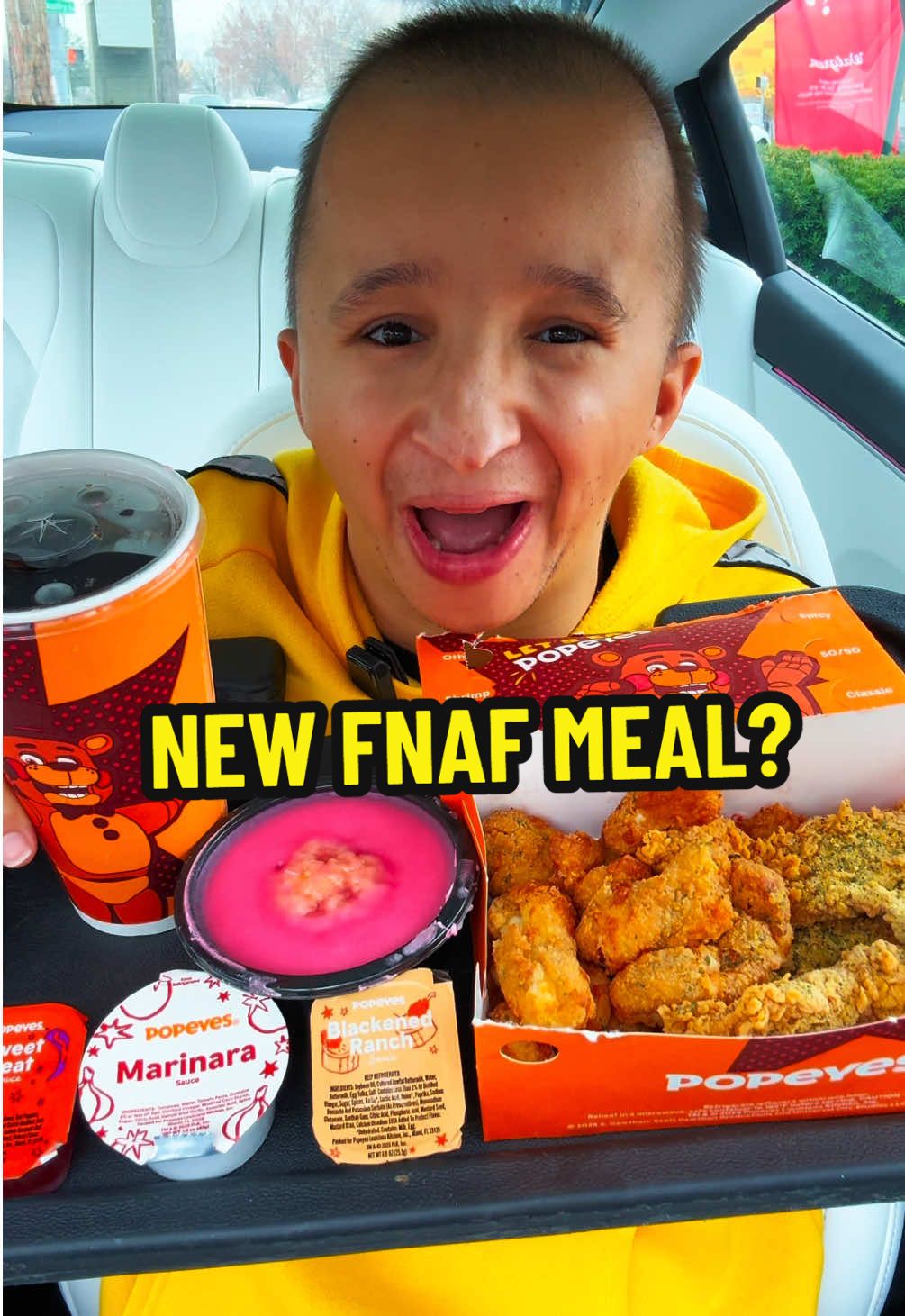 TikTok post by @jshock9nine for Popeyes. Caption reads: Trying Five nights at Freddy’s 2 meal @Popeyes....