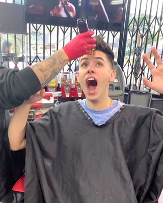 Instagram post by an influencer for Bang Energy Drink. Caption reads: Watch me get a haircut 💇‍♂️ 🥰 @BangEnergy....