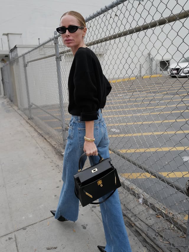 Instagram post by @aninebing for ANINE BING. Caption reads: [...] cashmere knit/Hugh Jean/Hilda boots....