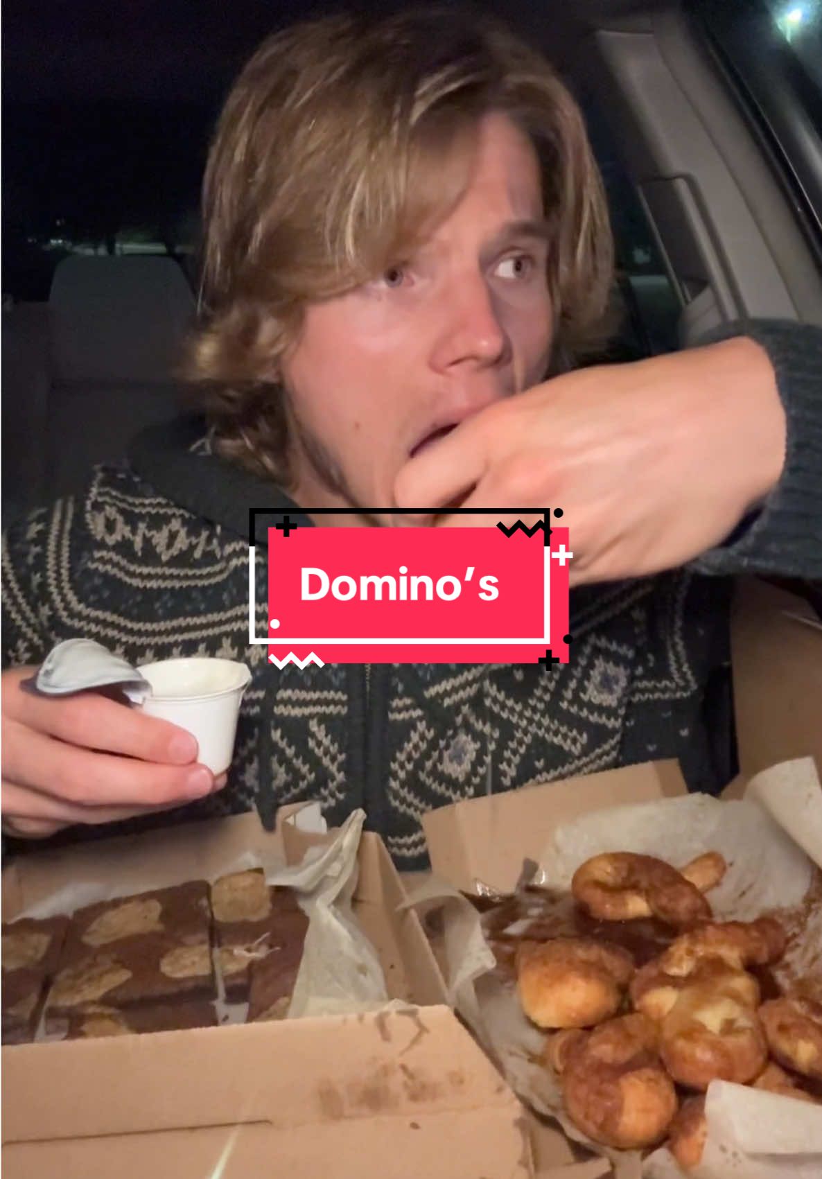 TikTok post by @ianjackedeats for Domino's. Caption reads: #ad I can’t stop eating @Domino’s desserts....