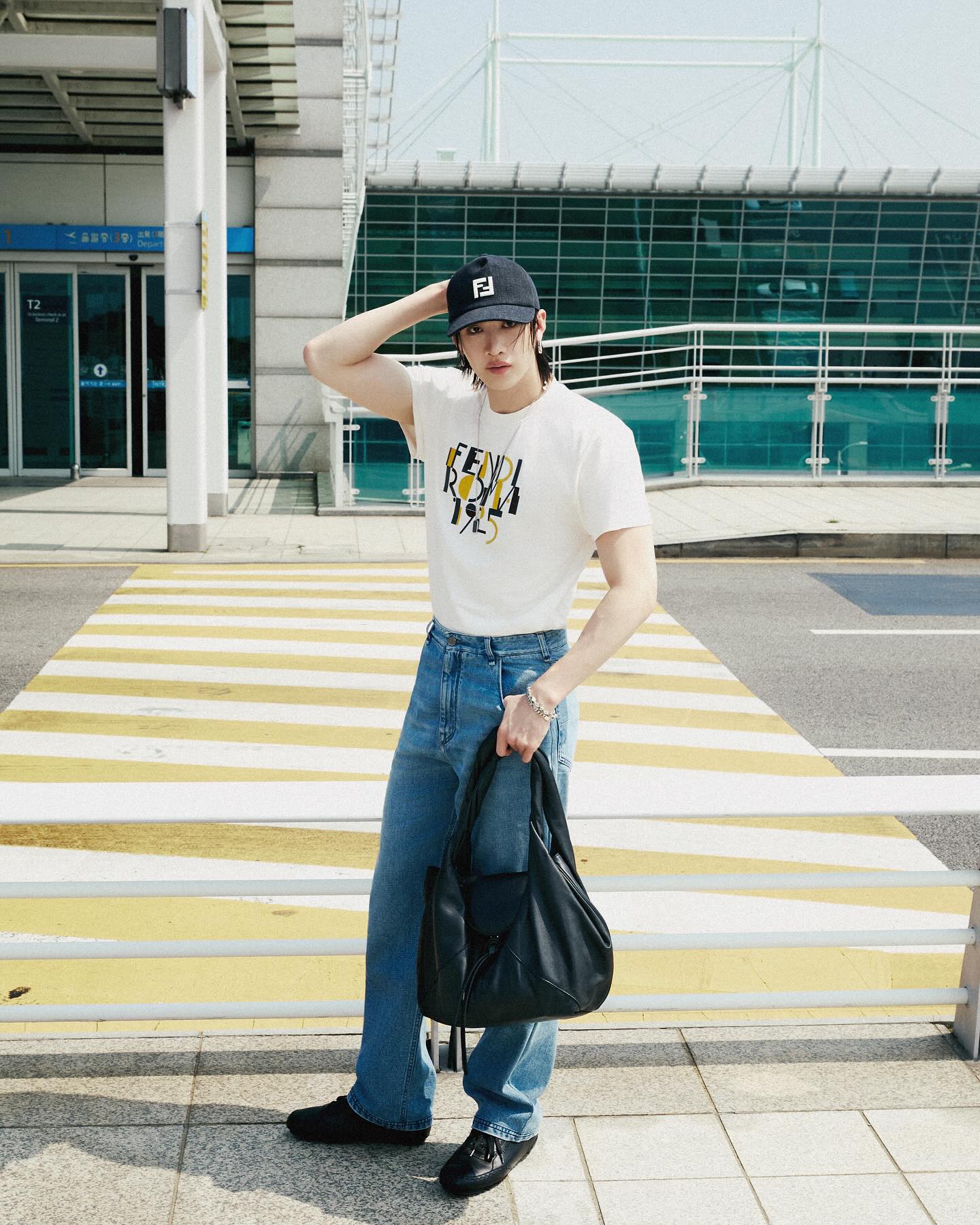 Instagram post by @gnabnahc for Fendi. Caption reads: #FendiAmbassador Bang Chan with Fendi Spy....