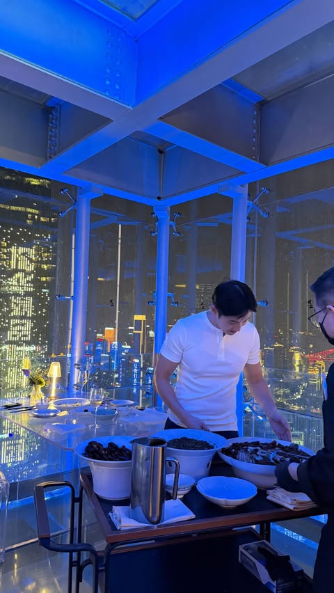 Instagram post by @immikeyu for Marriott Bonvoy. Caption reads: [...] first dinner in Chongqing 🇨🇳 #ad....