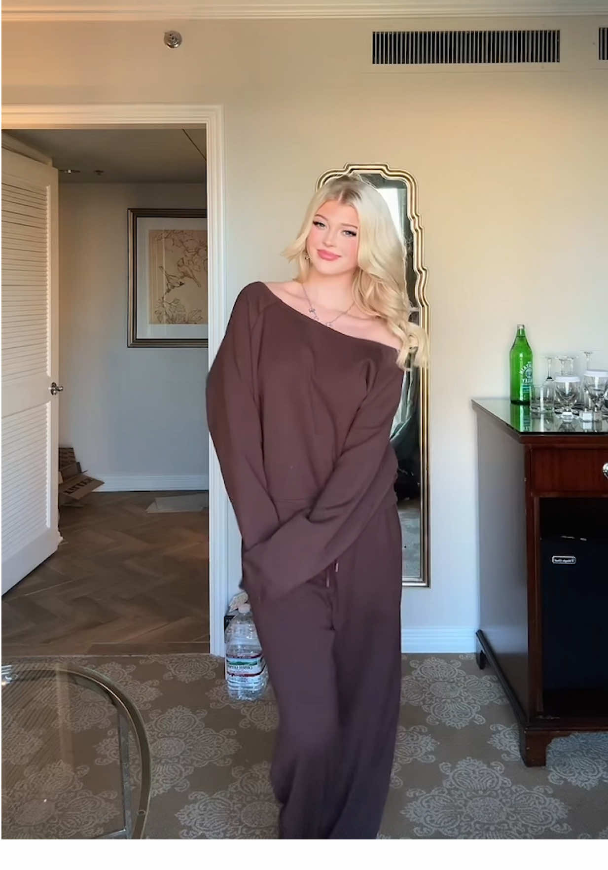 TikTok post by @lorengray for Tillys. Caption reads: #AD Trying on some of my favorite Tillys looks....