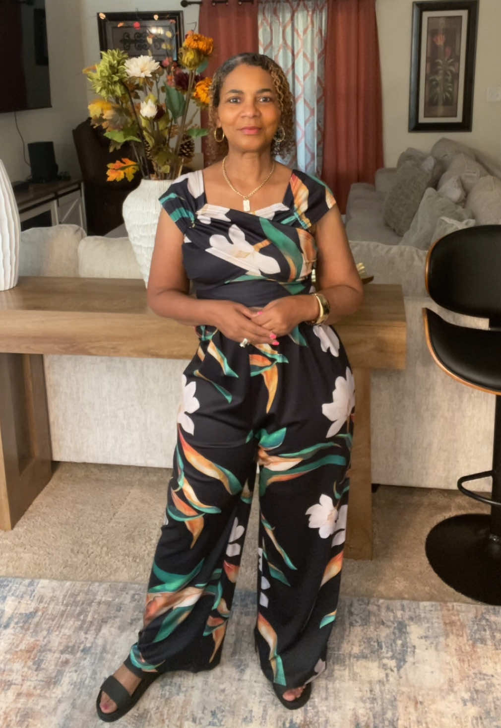 TikTok post by an influencer for Sylure. Caption reads: [...] has a asymmetrical design. @Sylure #jumpsuit....