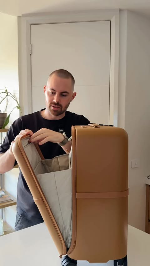 Instagram post by @bradcanning for July. Caption reads: The new Capsule Carry On Pro from @july is going....