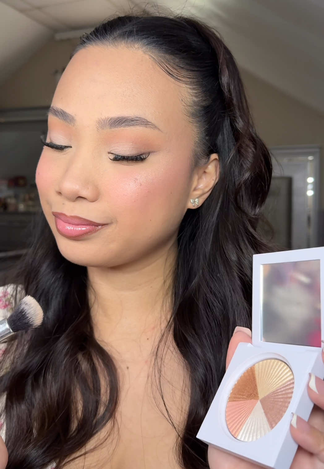 TikTok post by @anjane.xo for OFRA Cosmetics. Caption reads: @OFRA Cosmetics, LLC  highlighter in [...].