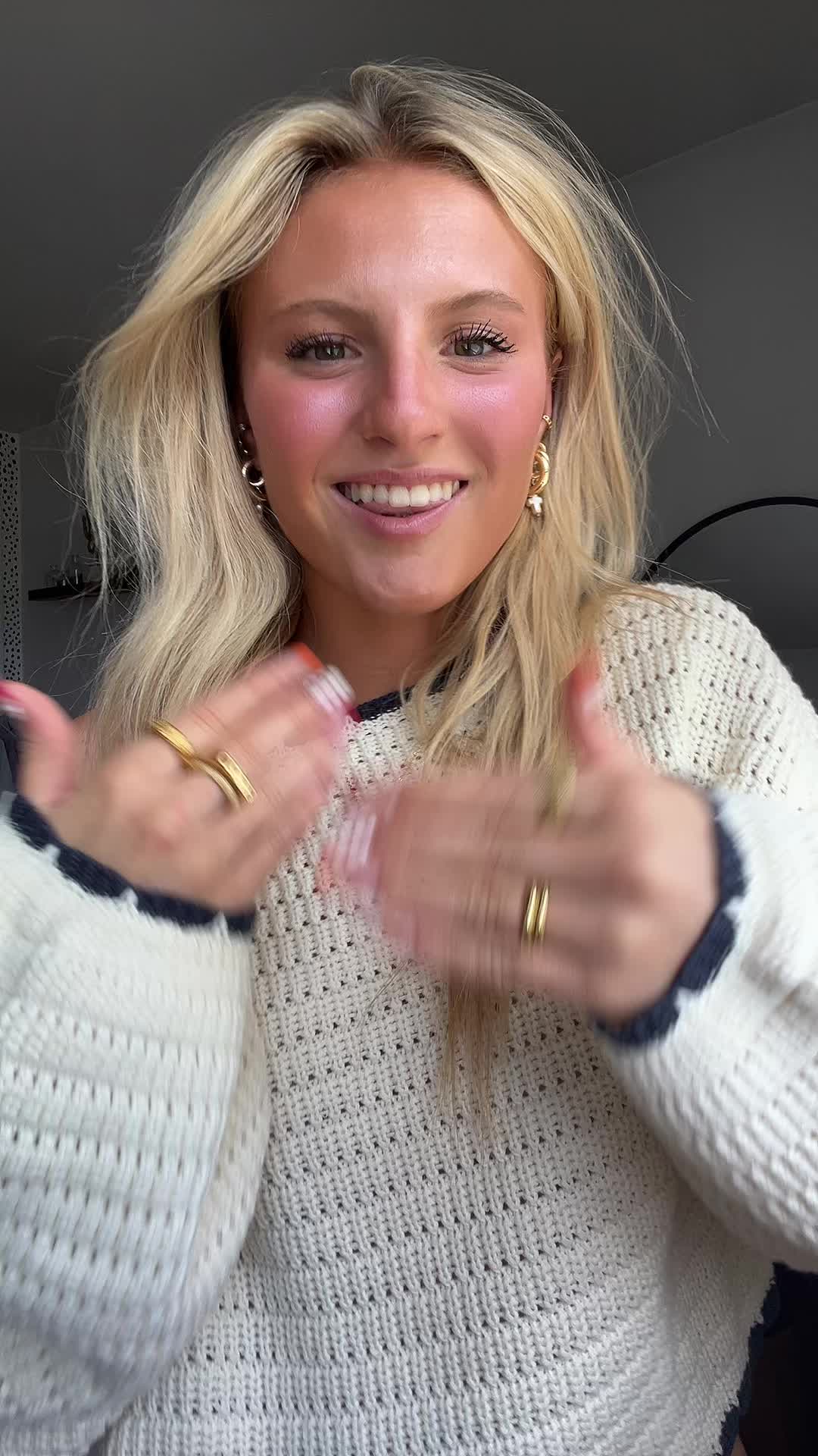 TikTok post by @ella.stough for greybandit. Caption reads: sweater from @greybandit code XOELLA for 15%....