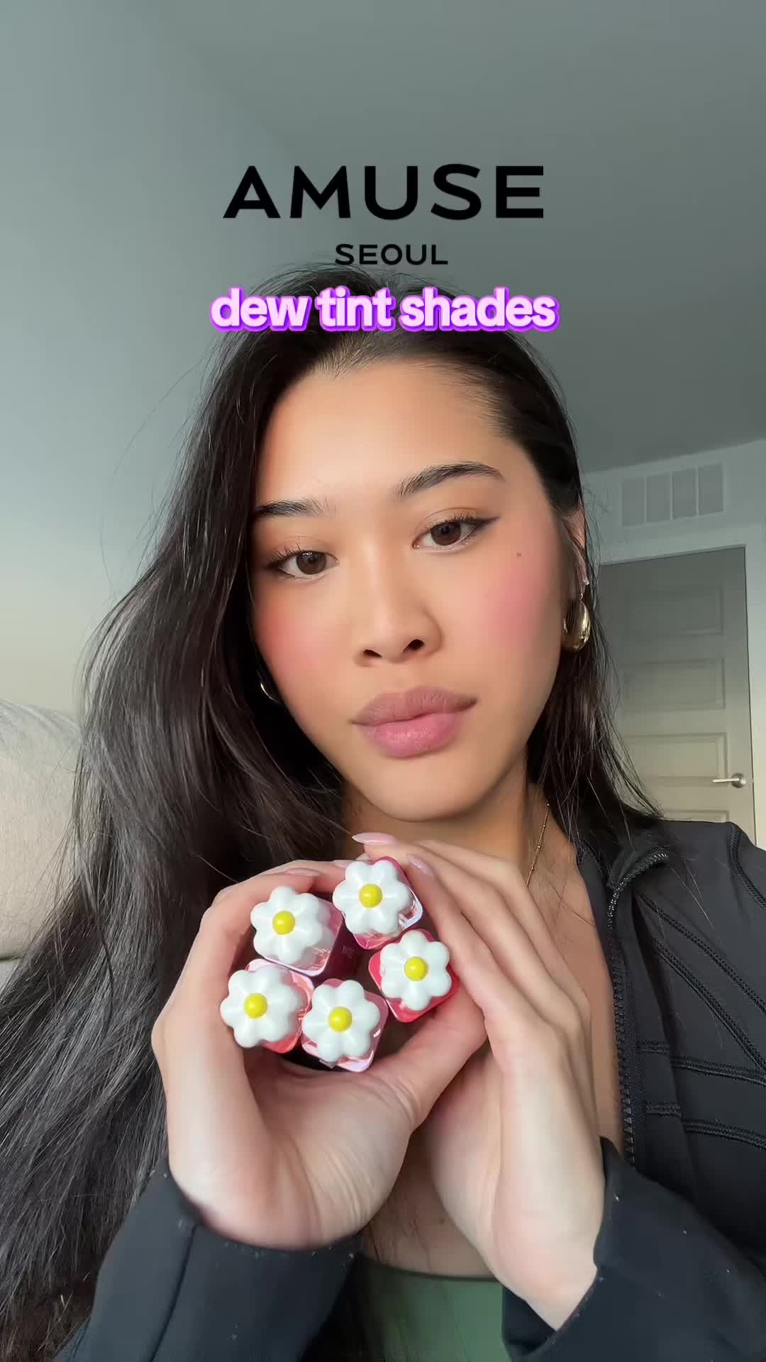 TikTok post by @briohni for AMUSE Seoul. Caption reads: this is going with me everywhere @AMUSE Seoul ....