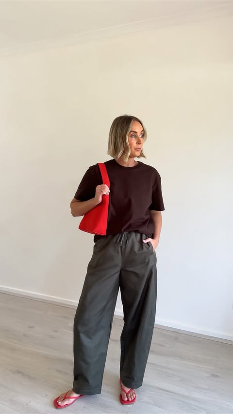 Instagram post by @lindseysharlassian for Assembly Label. Caption reads: Styling three of my go-to tees from @assemblylabel....