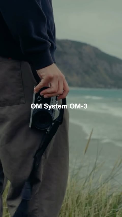 Instagram post by @codybryce_ for OM SYSTEM. Caption reads: Life on the road with the @omsystem.cameras OM-3....