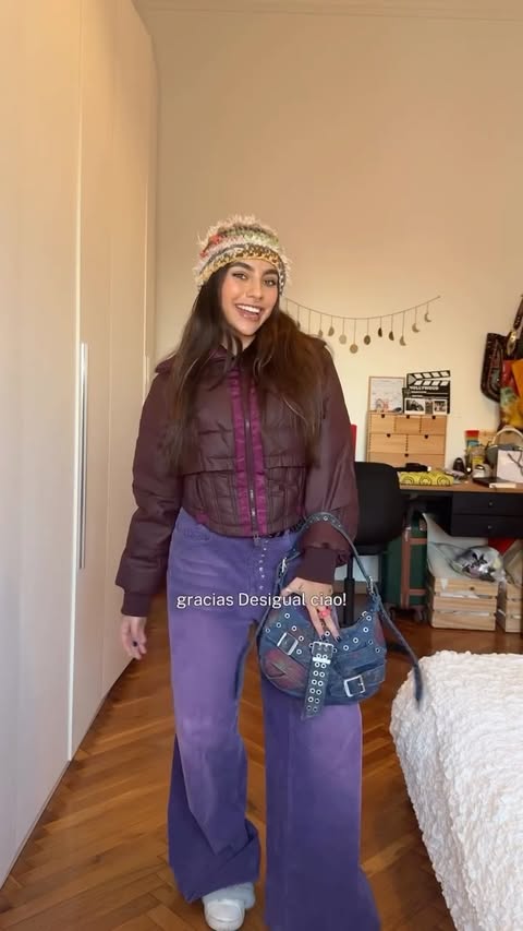 Instagram post by @camii_celis for Desigual. Caption reads: [...] viola come mio asciugamano💜 
@desigual....