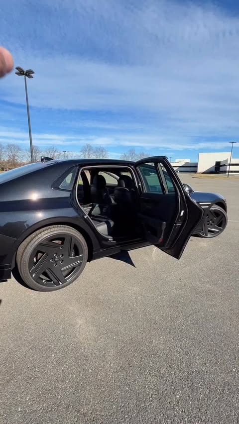 Instagram post by @omardrives for Genesis USA. Caption reads: Genesis is going crazy! Meet the 2026 Genesis G90....