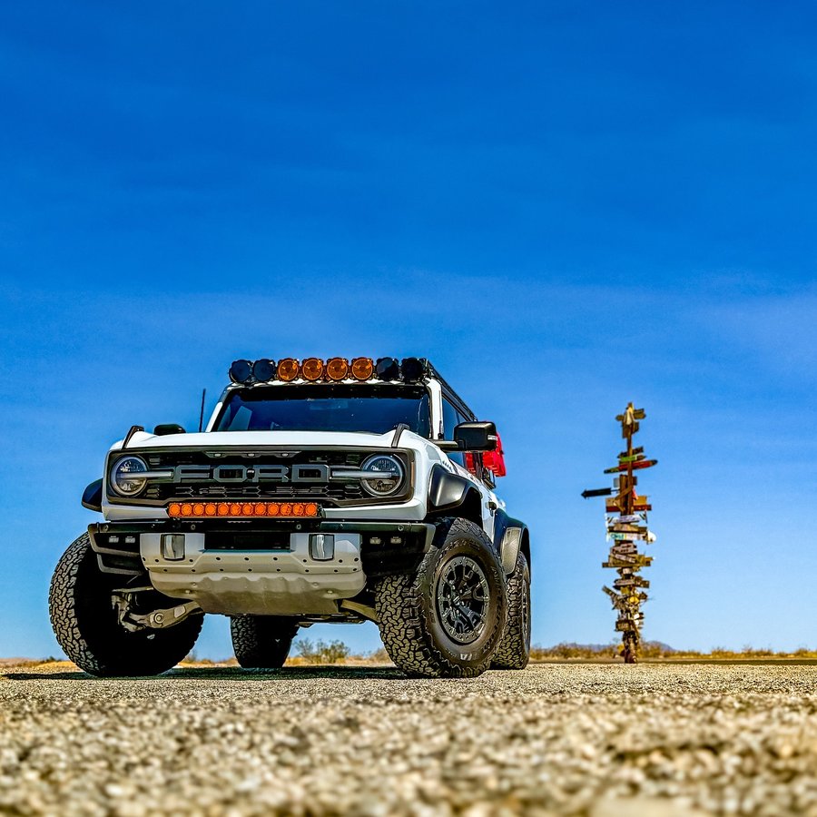 Instagram post by @mad_yeti_ for Rugged Radios. Caption reads: [...] sign post. #travel Partners: - Rugged Radios....