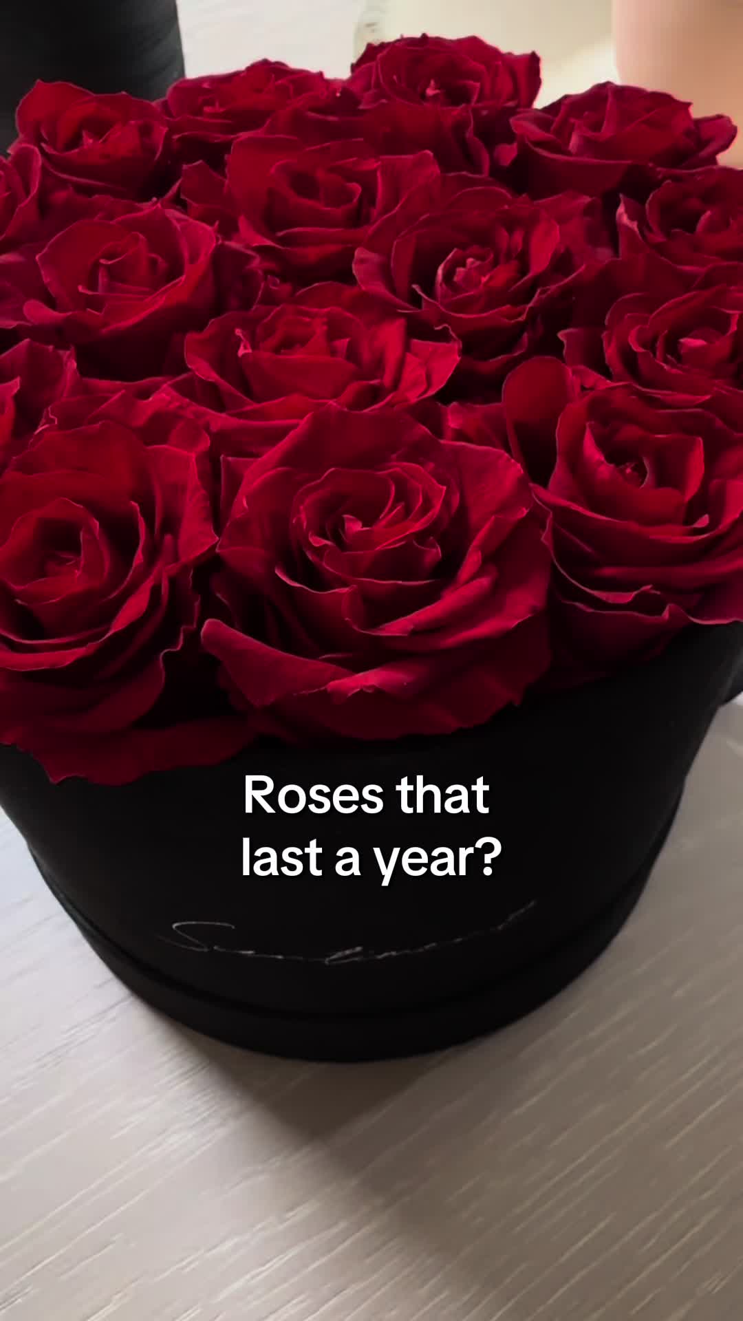 TikTok post by @anotherkhaicreation for Scentiment. Caption reads: Roses that last a year? @Scentiment Perfect....