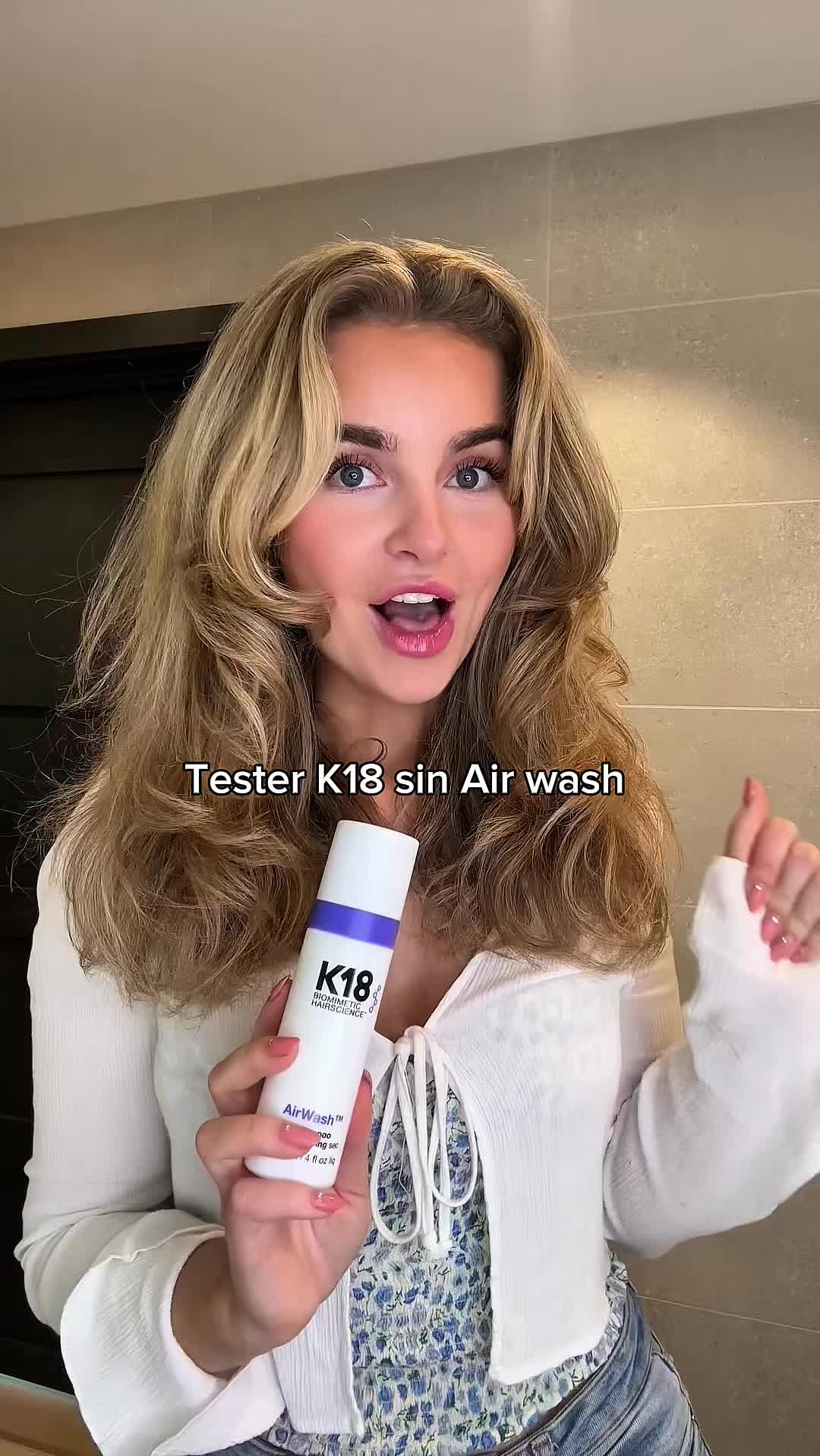 TikTok post by @isabellaschack for K18 Hair. Caption reads: Hands down den beste tørrsjampoen jeg har....