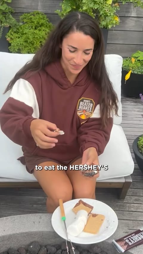 Instagram post by @alyraisman for HERSHEY'S Chocolate. Caption reads: So many great memories of making s’mores with my....