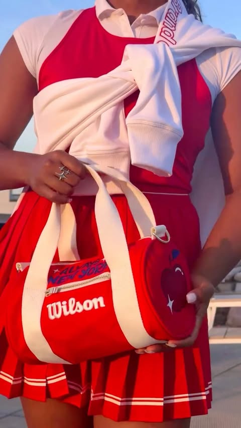 Instagram post by @oliviaellis.studio for Wilson Sporting Goods. Caption reads: This @wilson DIY was a long time coming 😍❤️🎨🍎....