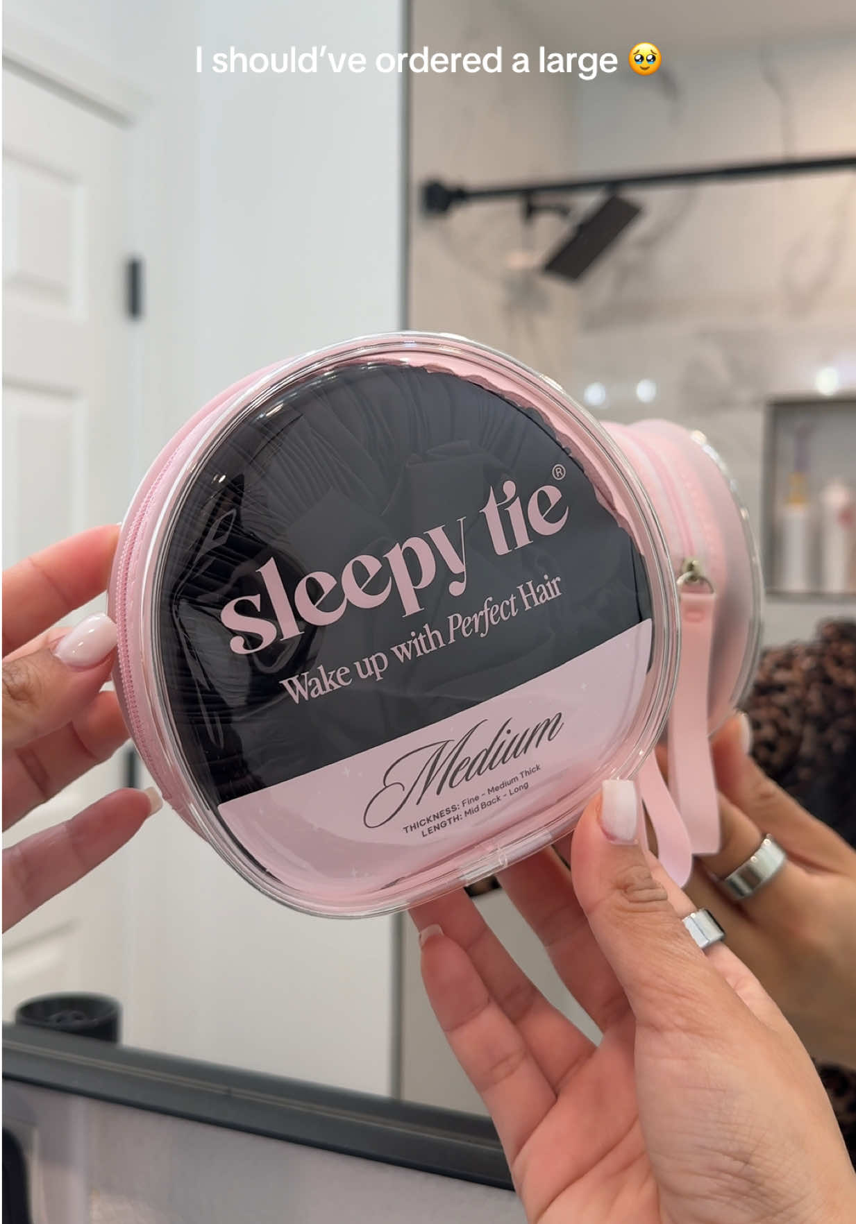 TikTok post by @kendrahhlopezz for Sleepy Tie. Caption reads: [...] gonna test it on my moms hair 🖤 @The Sleepy....